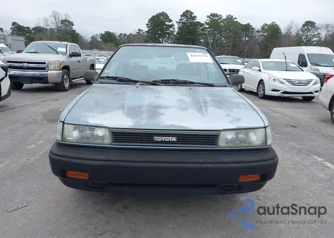 1990 Toyota Corolla Dlx z USA, uszkodzony, nr VIN 1NXAE94A7LZ153559